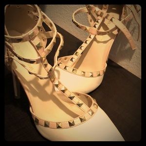 Cream colored/ gold studded heels.